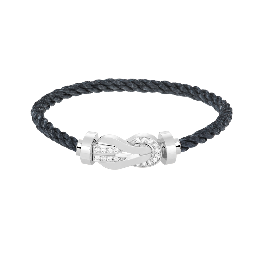??MIRA?¡¥CHANCE LARGE 8 FIGURE BUCKLE HALF DIAMOND BRACELET SILVER