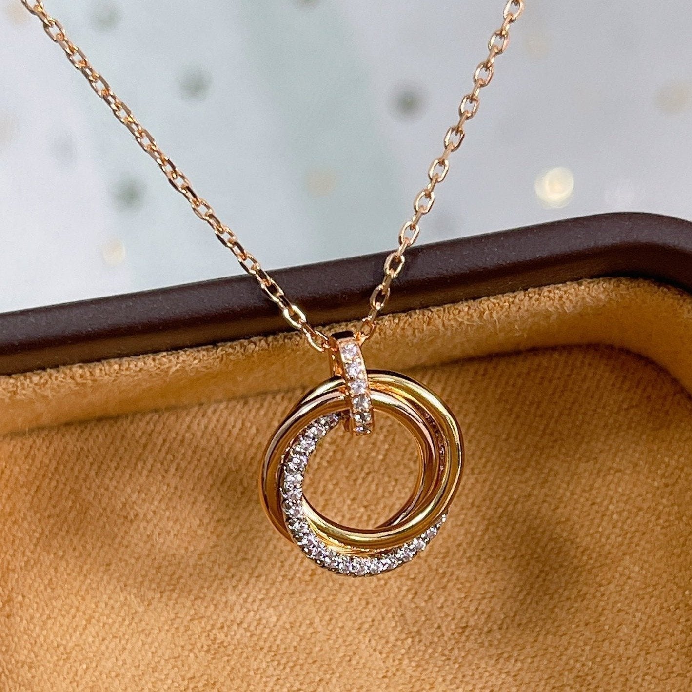 ??MIRA?¡¥TRINITY NECKLACE SILVER GOLD PINK GOLD DIAMONDS
