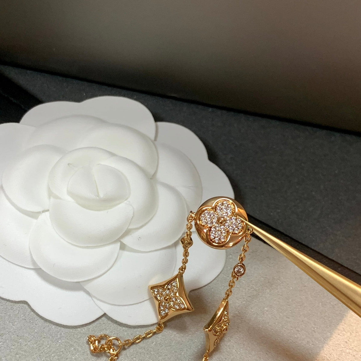 ??MIRA?¡¥STAR AND SUN 4 MOTIFS GOLD DIAMONDS BRACELET