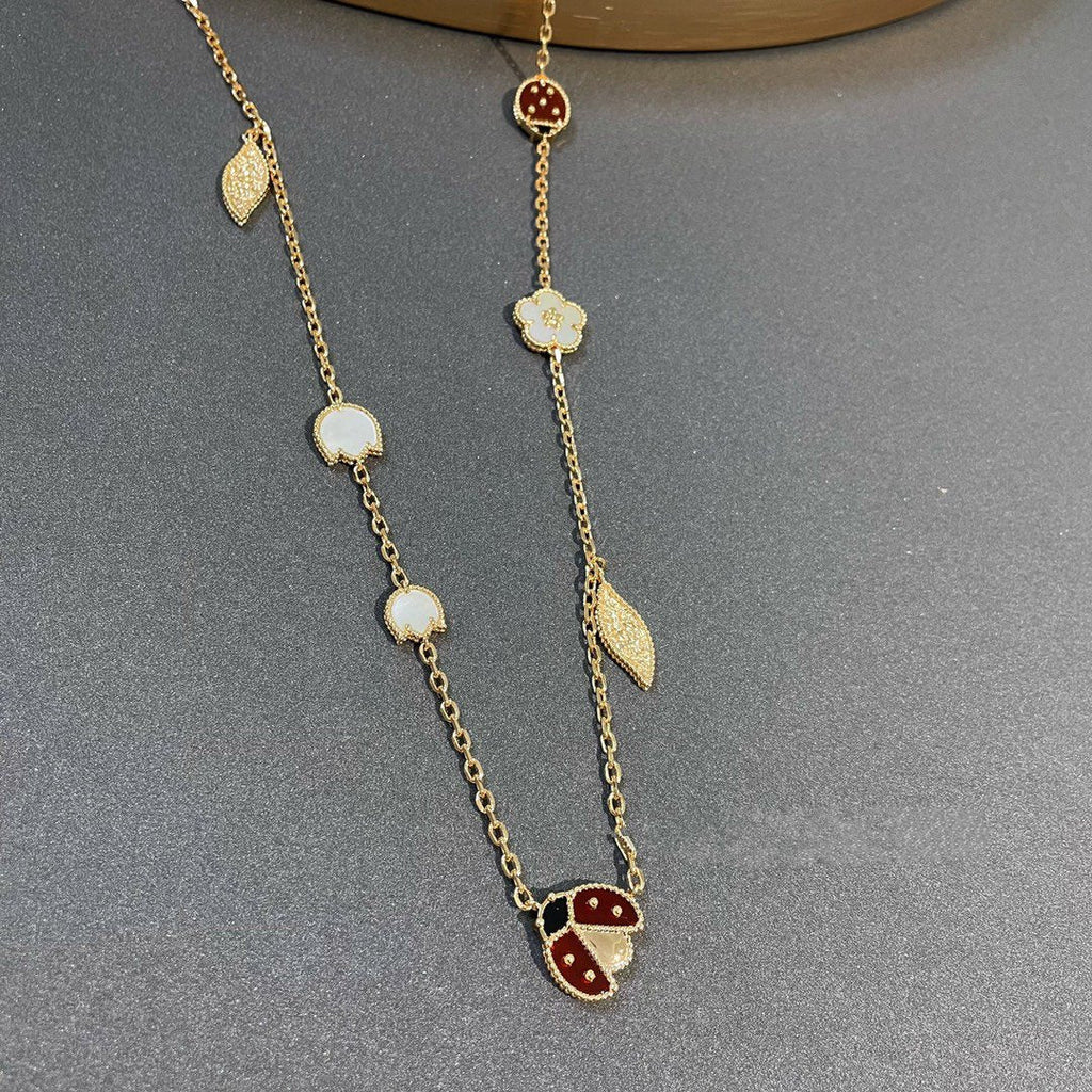 ??MIRA?¡¥LUCKY SPRING 15 MOTIFS GOLD NECKLACE