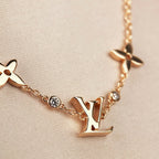 ??MIRA?¡¥STAR AND SUN 7 MOTIFS GOLD BRACELET