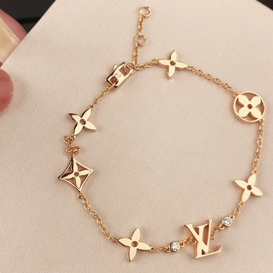 ??MIRA?¡¥STAR AND SUN 7 MOTIFS GOLD BRACELET