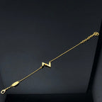 ??MIRA?¡¥VOLT LV LOGO BRACELET