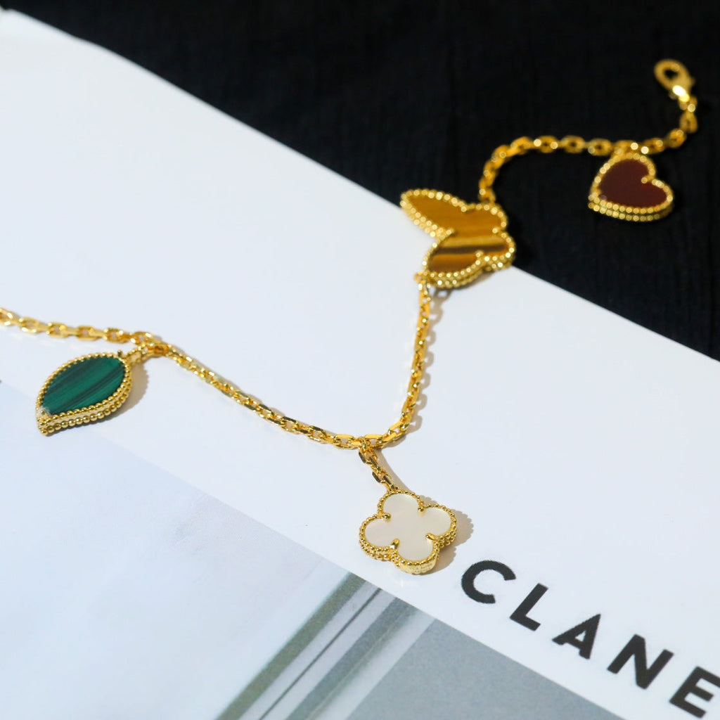 ??MIRA?¡¥LUCKY SPRING 5 MOTIF GOLD BRACELET