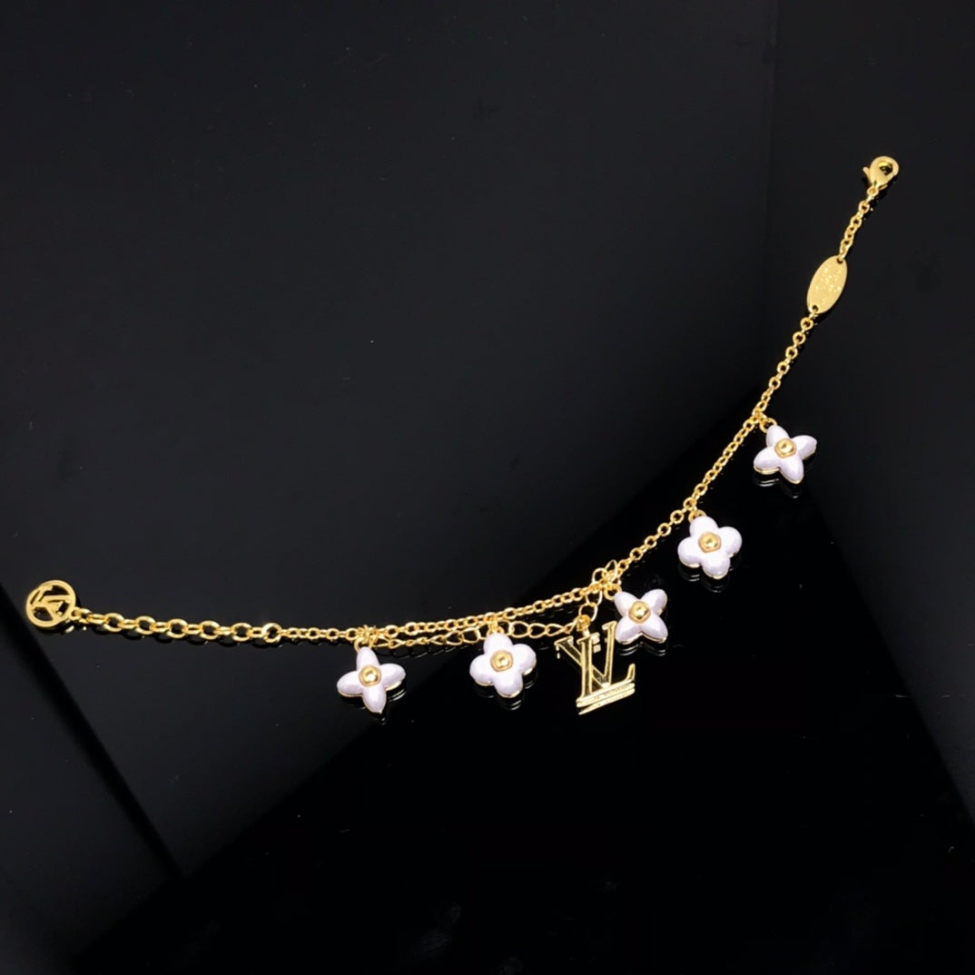 ??MIRA?¡¥LOGO 6 MOTIF STAR AND SUN GOLD BRACELET