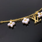 ??MIRA?¡¥LOGO 6 MOTIF STAR AND SUN GOLD BRACELET
