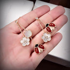 ??MIRA?¡¥LUCKY LADYBUG WHITE MOP EARRINGS