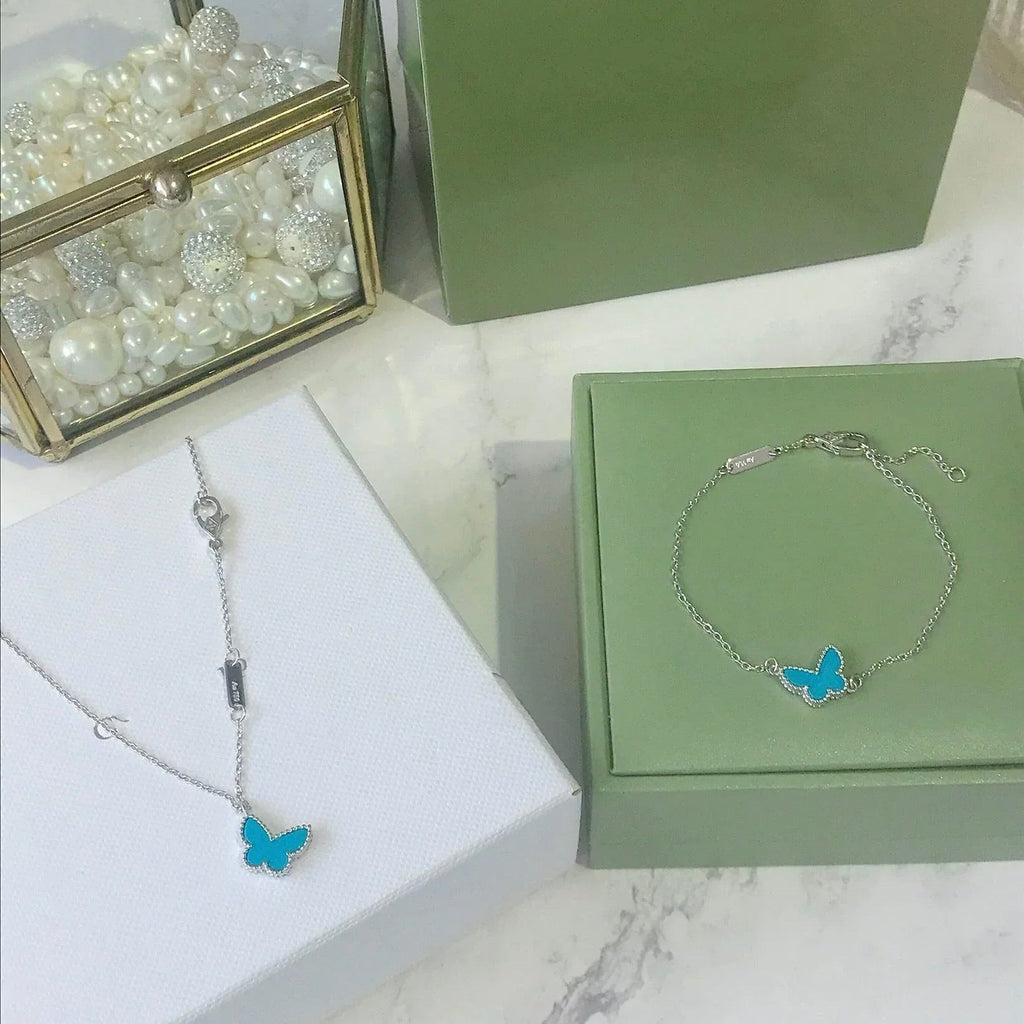 ??MIRA?¡¥BUTTERFLY TURQUOISE BUTTERFLY BRACELET SILVER