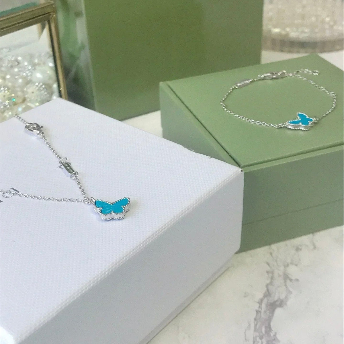 ??MIRA?¡¥BUTTERFLY TURQUOISE BUTTERFLY BRACELET SILVER