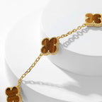 ??MIRA?¡¥CLOVER 10 MOTIFS TIGER EYE NECKLACE