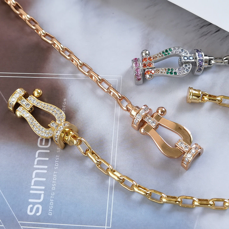 ??MIRA?¡¥FORCE LARGE HORSESHOE CLASP  METAL BRACELET