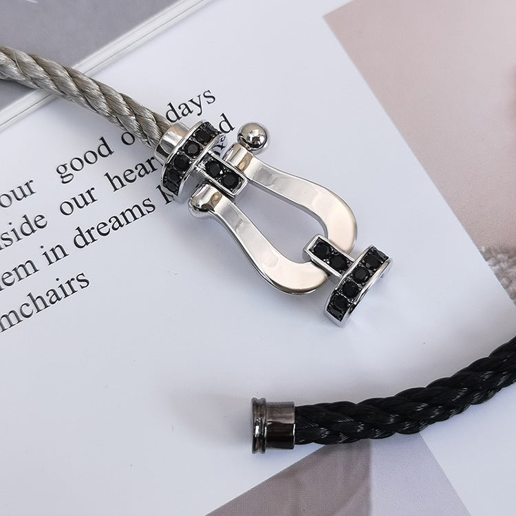 ??MIRA?¡¥FORCE LARGE HORSESHOE BLACK DIAMOND BRACELET SILVER