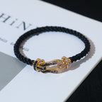 ??MIRA?¡¥FORCE LARGE HORSESHOE BLACK WHITE DIAMOND BRACELET SILVER