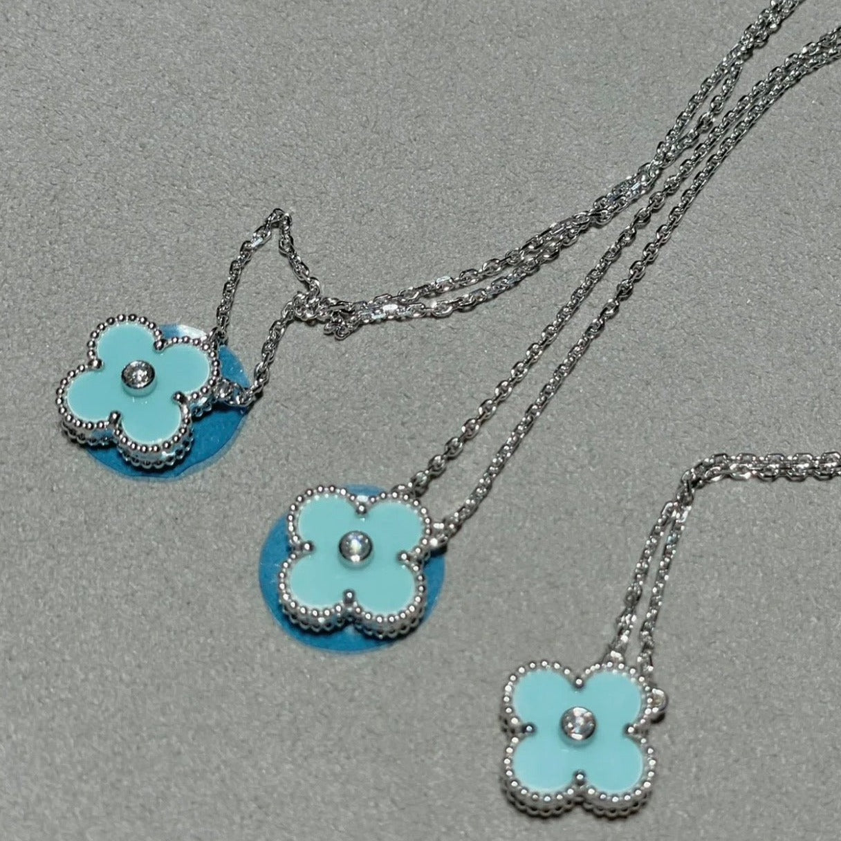 ??MIRA?¡¥CLOVER 1 DIAMOND LIGHT BLUE SILVER NECKLACE