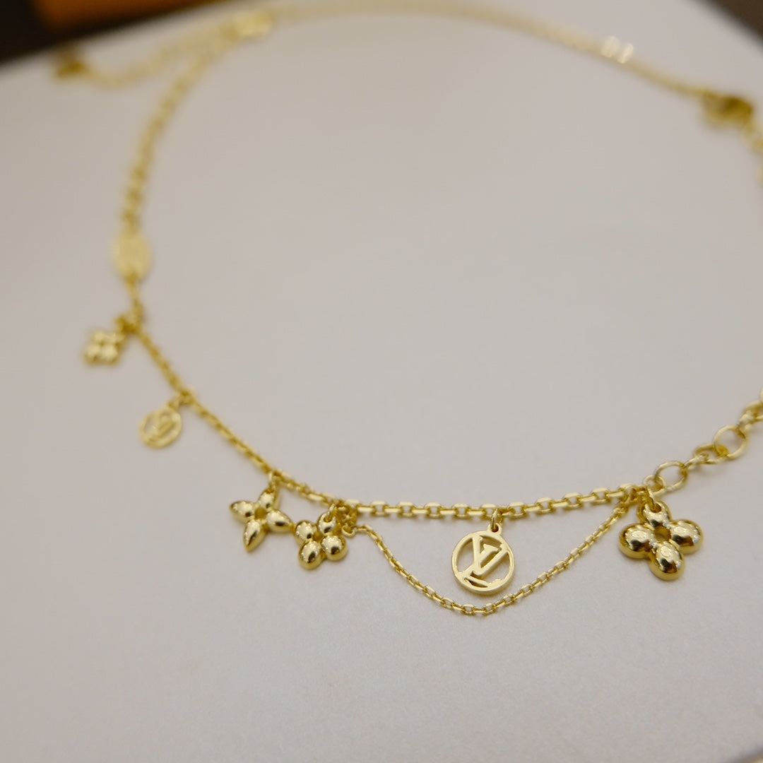 ??MIRA?¡¥BLOOMING SUPPLE NECKLACE BRASS