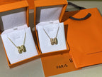 ??MIRA?¡¥HM CLIC YELLOW ENAMEL GOLD NECKLACE