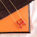 ??MIRA?¡¥HM CLIC RED ENAMEL GOLD NECKLACE