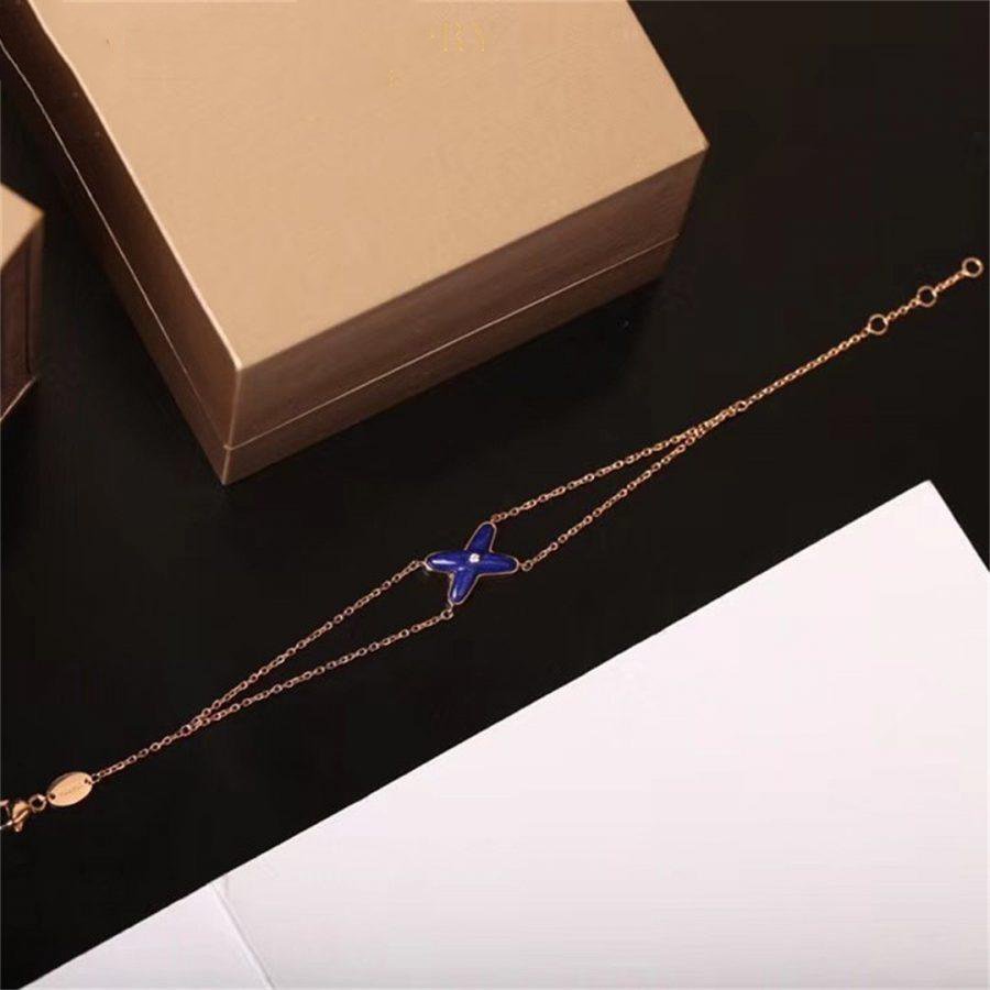 ??MIRA?¡¥Hollow Design Four-Leaf Clover Flower Shape Ring