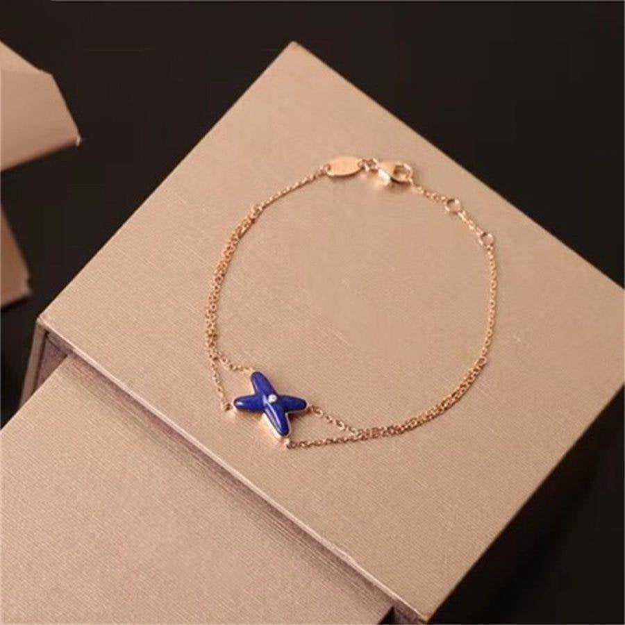 ??MIRA?¡¥Hollow Design Four-Leaf Clover Flower Shape Ring